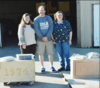 Maple River Heritage Inc. board members Sandi Garlow, Tim Solie and Coleen Lindemann opened the time capsules in the 1931 and 1974 cornerstones of the school building in Mapleton on Friday, April 14, 2023